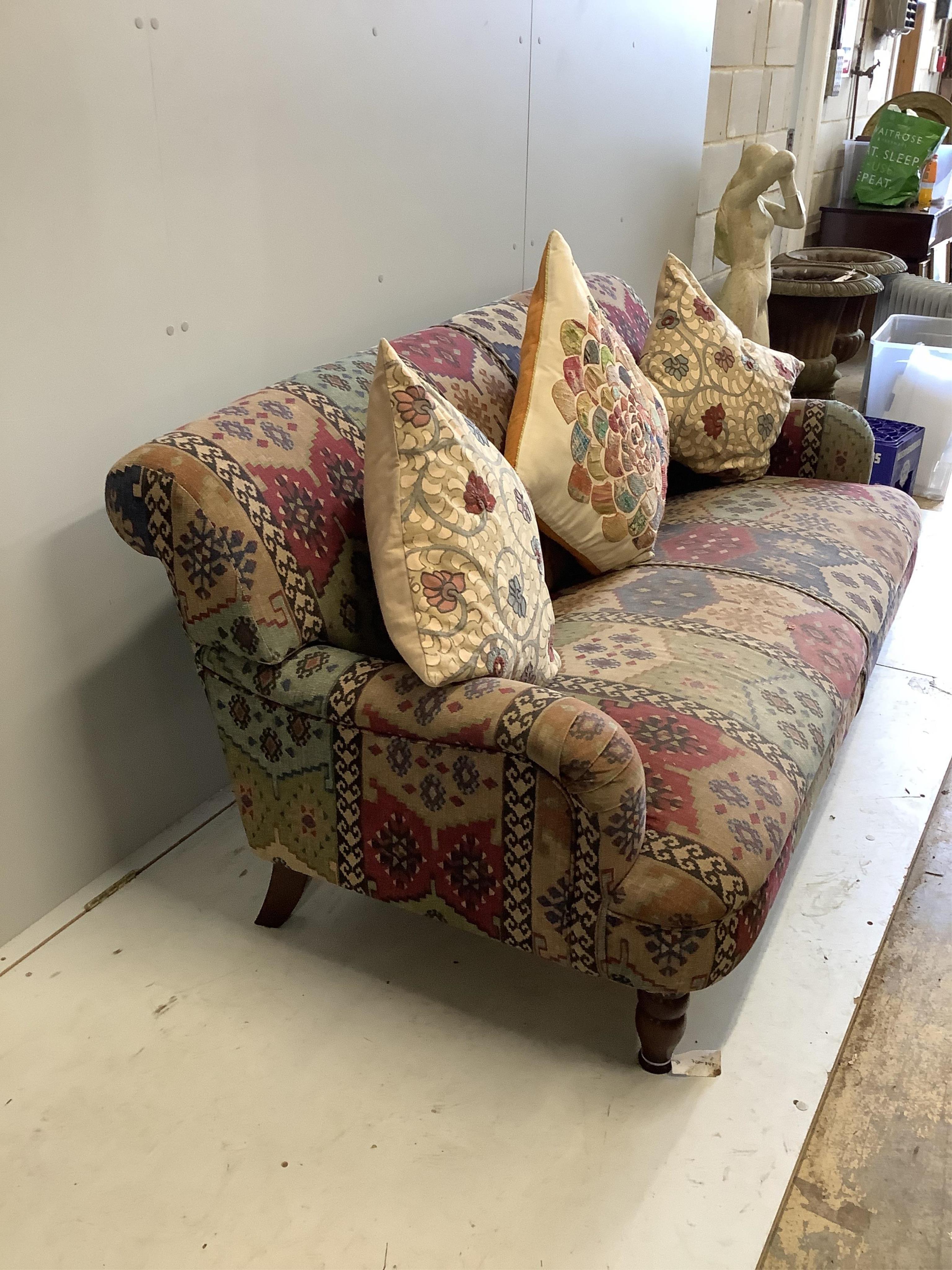 A two seater settee with Kilim style upholstery, width 178cm, depth 90cm, height 78cm. Condition - fair